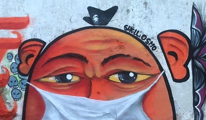 Grafite de Shell Osmo com pessoa de máscara